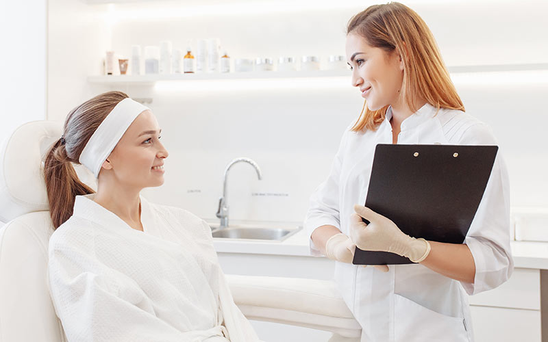 A woman having consultation at beauty clinic | Careers Collectiv